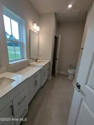 1276 Piper Glen Drive, Sunset Beach, NC 28468 — 3-bedroom home in Sea Trail Plantation, Sunset Beach, NC, photo 8 of 17: Bathroom