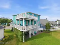 817 Ketch Court, Kure Beach, NC 28449 — 4-bedroom home in Kure Beach Village, Kure Beach, NC, photo 5 of 56: 7-web-or-mls-dji_20260430170704_0665_d