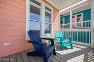 233 Sea Dreams Drive, Atlantic Beach, NC 28512 — 3-bedroom home in Sea Dreams, Atlantic Beach, NC, photo 3 of 68: right front porch