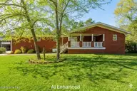 102 Fox Run Drive, Hampstead, NC 28443 — 3-bedroom home in Foxfield, Hampstead, NC, photo 6 of 60: AI Enhanced Front House photo