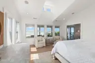 585 Forest Dunes Drive, Pine Knoll Shores, NC 28512 — 4-bedroom waterfront home in Beacon's Reach, Pine Knoll Shores, NC, photo 22 of 68: Luxurious second floor primary suite