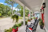 3623 White Cliffs Drive, Castle Hayne, NC 28429 — 3-bedroom waterfront home in River Bluffs, Castle Hayne, NC, photo 13 of 70: 3623 White Cliffs porch