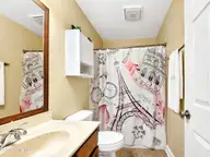 1660 Cedar Point Circle, Elizabeth City, NC 27909 — 3-bedroom home in Hunters Lake, Elizabeth City, NC, photo 15 of 21: Hall Bathroom