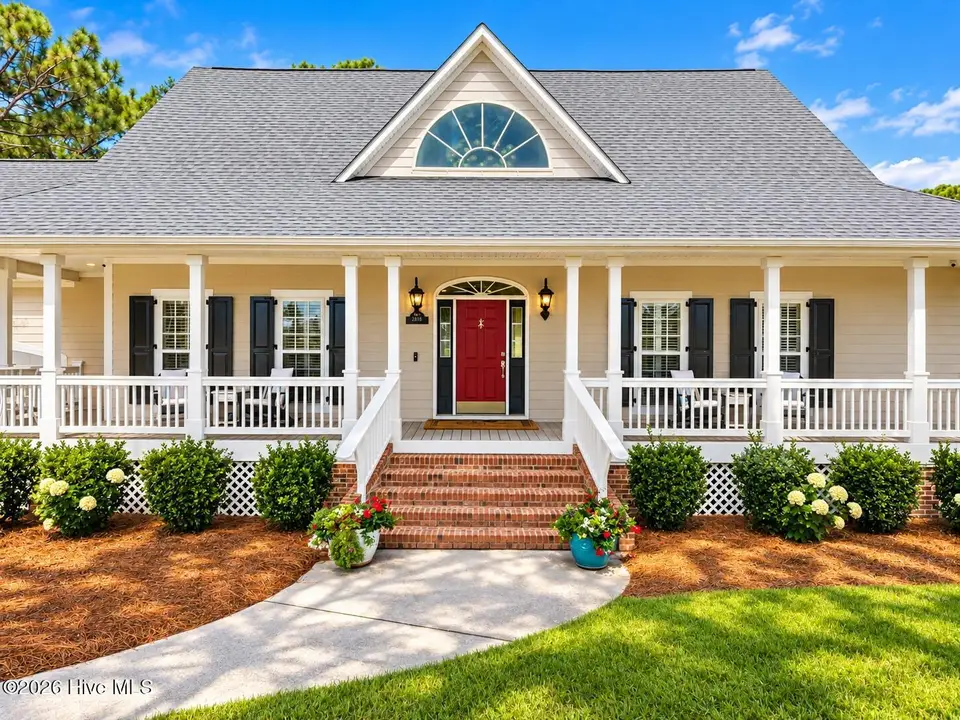 2816 Trailwood Drive SE, Southport, NC 28461 — 4-bedroom home in St James, Southport, NC, photo 1 of 75: front