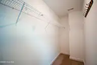427 Sunfish Lane, Sneads Ferry, NC 28460 — 2-bedroom townhome in Beachside Commons, Sneads Ferry, NC, photo 18 of 27: Primary Walk in Closet