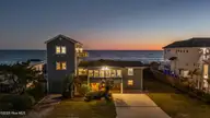 5419 W Beach Drive, Oak Island, NC 28465 — 7-bedroom waterfront home, Oak Island, NC, photo 1 of 69: 1_twilight