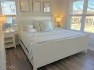 209 W Beach Drive, Oak Island, NC 28465 — 5-bedroom waterfront home in W. Long Beach, Oak Island, NC, photo 23 of 60: 209 W Beach Drive 28