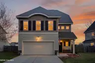 424 Bald Cypress Lane, Sneads Ferry, NC 28460 — 3-bedroom home in The Landing at Mill Creek, Sneads Ferry, NC, photo 3 of 47: 424BaldCypressLane-2_Dusk