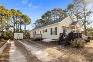 139 Bayshore Street, Sea Level, NC 28577 — 3-bedroom waterfront home in Sea Level Inn, Sea Level, NC, photo 6 of 52: 9-web-or-mls-1S3A7316