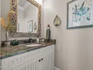 6414 Ocean Drive, Emerald Isle, NC 28594 — 5-bedroom waterfront home in Sea Crest, Emerald Isle, NC, photo 24 of 56: Half bathroom, top floor landing