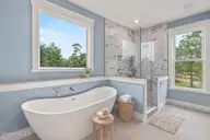 402 Harrison Court, Sneads Ferry, NC 28460 — 3-bedroom waterfront home in Marsh Haven Landing, Sneads Ferry, NC, photo 18 of 67: Staged Primary Bath