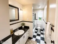 34 Holland Drive, Castle Hayne, NC 28429 — 3-bedroom home in Wrightsboro Acres, Castle Hayne, NC, photo 17 of 22: Main Bathroom 1