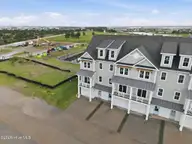 200 Olde Towne Yacht Club Drive 50, Beaufort, NC 28516 — 4-bedroom waterfront townhome in Inlet Cove Townhomes, Beaufort, NC, photo 4 of 53: 3-web-or-mls-DJI_20260707102949_0002_D_e