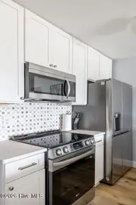 9100 Reed Drive 4101, Emerald Isle, NC 28594 — 1-bedroom condo in Queens Court, Emerald Isle, NC, photo 5 of 20: 4101 Kitchen 4