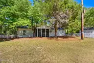 1235 Burning Tree Road 12, Pinehurst, NC 28374 — 3-bedroom home in Unit 12, Pinehurst, NC, photo 21 of 24: Rear view