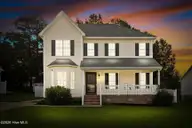 105 Green Bank Court, Rocky Mount, NC 27804 — 3-bedroom home in Charleston Place, Rocky Mount, NC, photo 1 of 44: Twilight Front Exterior