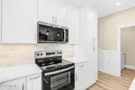 225 NE 75th Street, Oak Island, NC 28465 — 3-bedroom home in Tranquil Harbour Island, Oak Island, NC, photo 12 of 57