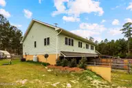230 Causey Road, Vass, NC 28394 — 3-bedroom waterfront home in Horse Country, Vass, NC, photo 22 of 44: House Side View