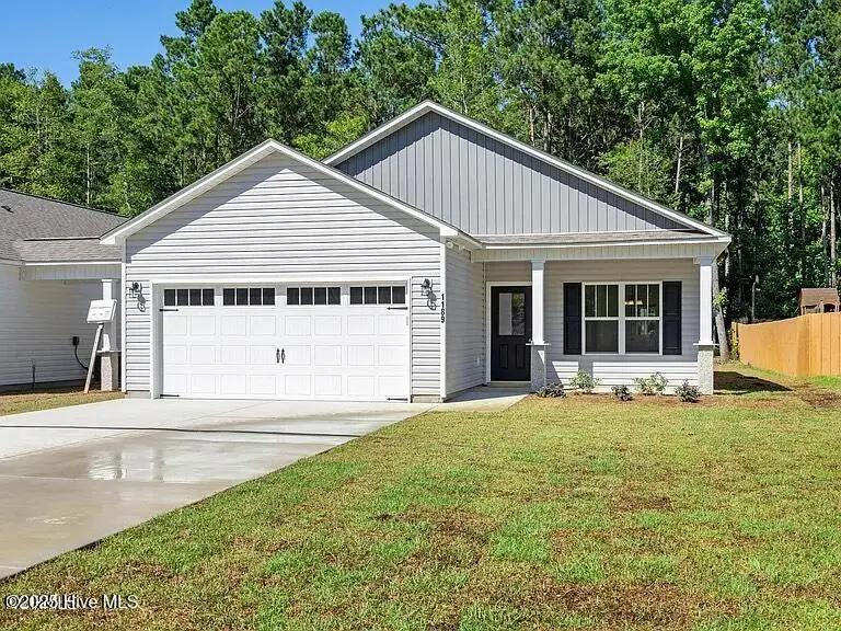 1189 Dan Owen Drive, Hampstead, NC 28443 — 3-bedroom home, Hampstead, NC, photo 1 of 27: Outside Front