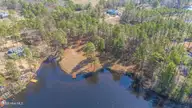 305 Lakewood Drive, Aberdeen, NC 28315 — waterfront lot in Lake Diamond, Aberdeen, NC, photo 9 of 12: 305 Lakewood Drive