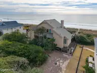 111 Dogwood Circle, Pine Knoll Shores, NC 28512 — 4-bedroom waterfront home in Pine Knoll Association, Pine Knoll Shores, NC, photo 10 of 52: Oceanfront home in Pine Knoll Shores