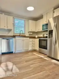 407 Maple Street SW, Shallotte, NC 28470 — 2-bedroom manufactured home in Lakewood Estates, Shallotte, NC, photo 5 of 26: Kitchen