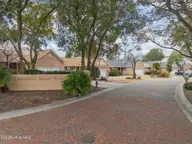 117 Lighthouse Drive, Carolina Beach, NC 28428 — 3-bedroom home in Carolina Beach Village, Carolina Beach, NC, photo 2 of 62: 13-web-or-mls-DJI_20260302140141_0784_D