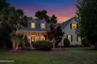 109 Currant Lane, Hampstead, NC 28443 — 4-bedroom waterfront home in Bent Tree, Hampstead, NC, photo 1 of 57