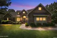 118 Jonathons Drive, West End, NC 27376 — 4-bedroom waterfront home in McLendon Hills, West End, NC, photo 1 of 69: 1-web-or-mls-118 Jonathons Dr- West End,
