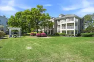 908 Resort Circle Unit 906, Sunset Beach, NC 28468 — 1-bedroom condo in Colony II, Sunset Beach, NC, photo 23 of 35: Rear of building