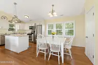 6611 Marsh Cove Road, Emerald Isle, NC 28594 — 3-bedroom waterfront home in Marsh Cove, Emerald Isle, NC, photo 16 of 52: Dining area
