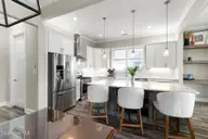 525 Sanders Lane, Newport, NC 28570 — 4-bedroom waterfront home in Bogue Watch, Newport, NC, photo 17 of 57: Kitchen with custom island
