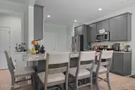 132 Freedom Park Road, Beaufort, NC 28516 — 3-bedroom home in Beau Coast West, Beaufort, NC, photo 16 of 47: Bar & Kitchen