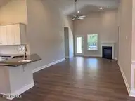 182 Cherry Laurel Drive, Wallace, NC 28466 — 4-bedroom home in River Landing, Wallace, NC, photo 8 of 28: Kitchen/Living combo