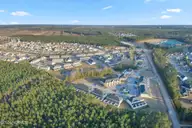 133 W Murrow Lane, Jacksonville, NC 28546 — 2-bedroom townhome in Carolina Plantations, Jacksonville, NC, photo 11 of 55: DJI_0839