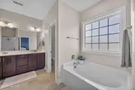 38 E Conolly Court, Hampstead, NC 28443 — 4-bedroom home in Hampstead Landing, Hampstead, NC, photo 21 of 55: Primary Bathroom View 1