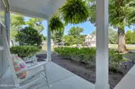 135 Darel Street, Rocky Point, NC 28457 — 4-bedroom waterfront home in Brick Chimney Landing, Rocky Point, NC, photo 5 of 72: Front Porch