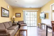 490 Little River Farm Boulevard A102, Carthage, NC 28327 — 2-bedroom condo in Little River Fa, Carthage, NC, photo 11 of 22: Living Room