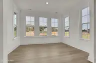 81 Planters Walk, Hampstead, NC 28443 — 4-bedroom waterfront home in East Wynd, Hampstead, NC, photo 8 of 34: Sunroom