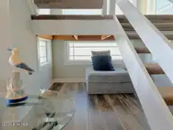 209 W Beach Drive, Oak Island, NC 28465 — 5-bedroom waterfront home in W. Long Beach, Oak Island, NC, photo 11 of 60: 209 W Beach Drive 15