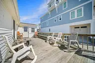 9105 W 9th Street, Surf City, NC 28445 — 3-bedroom waterfront manufactured home in Old Settlers Beach, Surf City, NC, photo 11 of 60: deck- 9105 9th St - Listing -42