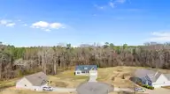 69 N Rippling Court, Smithfield, NC 27577 — 3-bedroom home in Waterview, Smithfield, NC, photo 10 of 28: Aerial