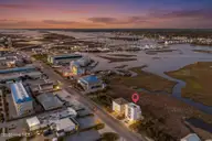 321 N New River Drive, Surf City, NC 28445 — 6-bedroom waterfront home, Surf City, NC, photo 5 of 73: 321NNewRiver_Aerial_01_Dusk_02