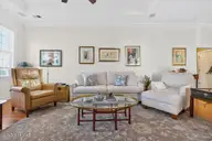 294 Sedgefield Place SW, Ocean Isle Beach, NC 28469 — 3-bedroom home in Ocean Ridge Plantation, Ocean Isle Beach, NC, photo 13 of 76: Living area with backyard view.