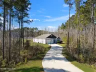 141 Fresh Air Drive, Hampstead, NC 28443 — 3-bedroom home in Hope Creek, Hampstead, NC, photo 2 of 51: 45-web-or-mls-GI - 141 Fresh Air Dr - Li