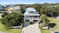 160 Seawatch Way, Kure Beach, NC 28449 — 4-bedroom waterfront home in Seawatch, Kure Beach, NC, photo 1 of 73: mls-DJI_20251106102259_0211_D