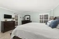1505 Salter Path Road 235 Summer Winds, Indian Beach, NC 28512 — 3-bedroom waterfront condo in Summer Winds Condominiums, Indian Beach, NC, photo 17 of 46: Primary bedroom suite