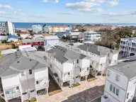 906 Second Street S 1, Carolina Beach, NC 28428 — 3-bedroom townhome in Social on Second, Carolina Beach, NC, photo 1 of 56: 44-web-or-mls-DJI_20250218143657_0578_D_