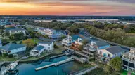 304 Causeway Drive Unit A, Wrightsville Beach, NC 28480 — 3-bedroom waterfront condo in Windswept, Wrightsville Beach, NC, photo 2 of 52: 002_dji_20260319192327_0736_d_copy_205