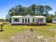 3296 Havelock Place SW, Shallotte, NC 28470 — 2-bedroom waterfront manufactured home in Shell Point Acres II, Shallotte, NC, photo 1 of 40: Kahunaphoto.com-